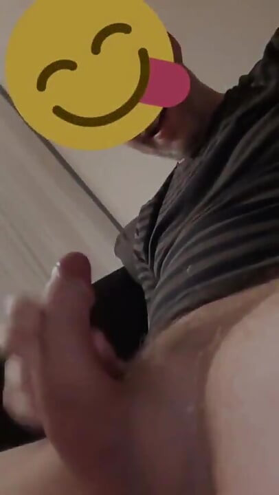 Me, Jonasponas, grabbing my thick cock and pumping out long strings of creamy cum onto my dark t-shirt