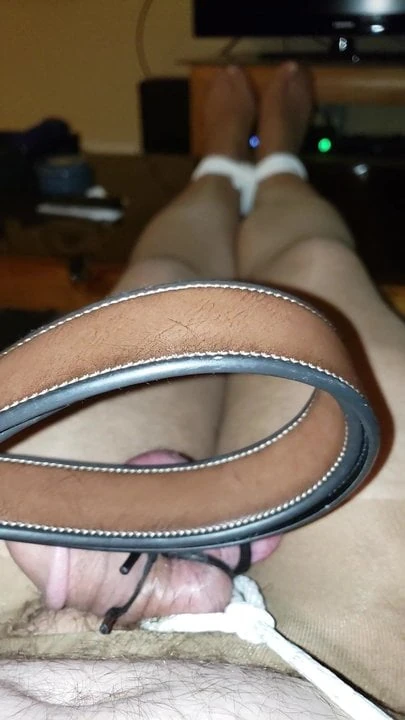 Bound cock and balls flogged in bondage and pantyhose