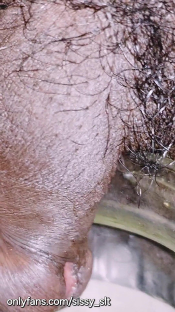 Must-see moment from "Limp little penis crossdresser pissing outdoor"