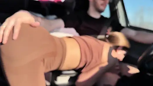 Sucking Her Driver Behind the Wheel