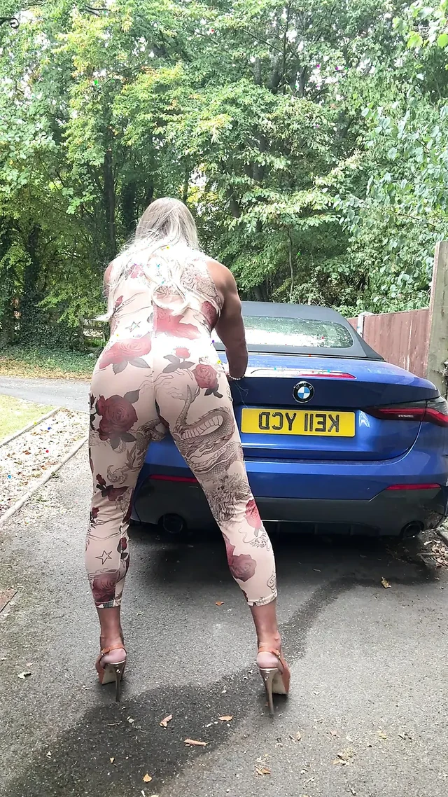 Sexy Crossdresser kellycd2022 in sexy floral see thru catsuit and heels