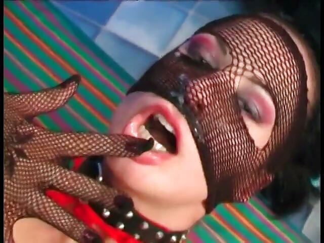 Slave in black latex costume explores all holes of fetish mistress