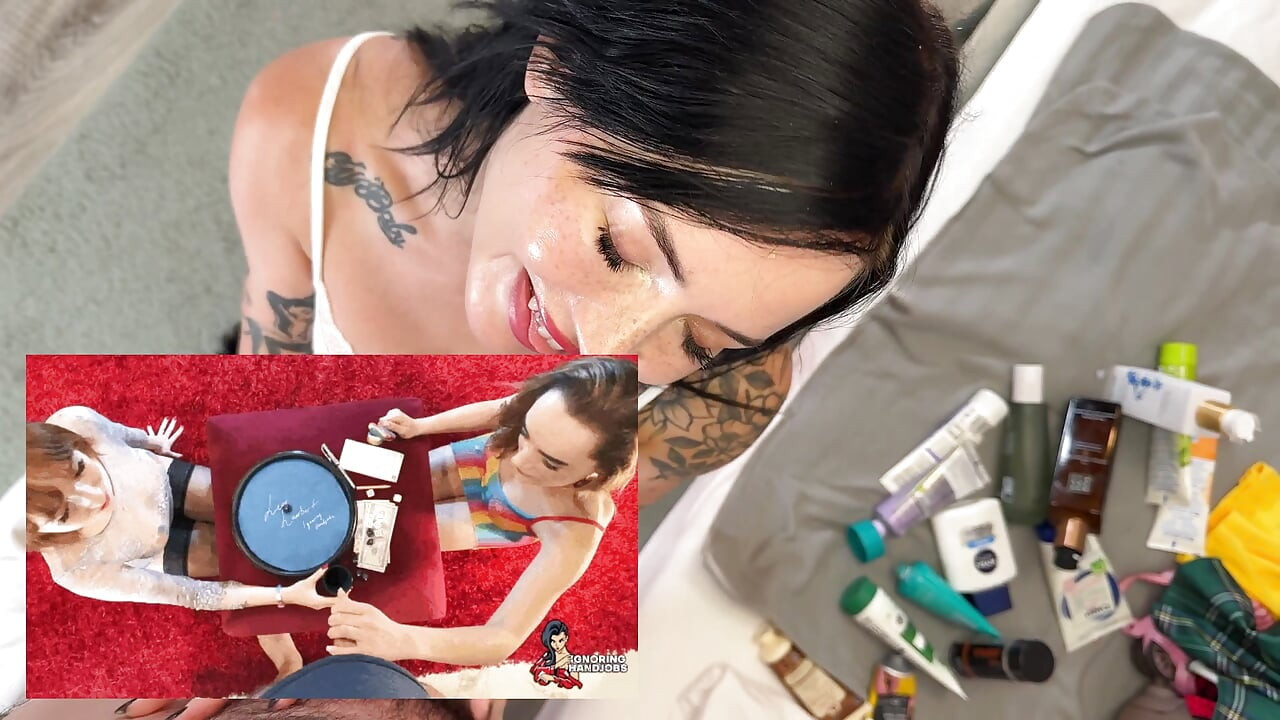 Hot and horny tattooed brunette babe gives an incredible handjob while trying on different cremes on a big cock