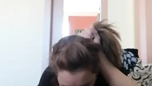 Sementara dia menonton TV, aku memberinya blowjob