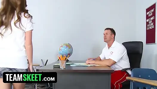 Sexy brunette spreads her legs wide in detention
