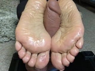 sexy latin step mom jerks a cock with her feet