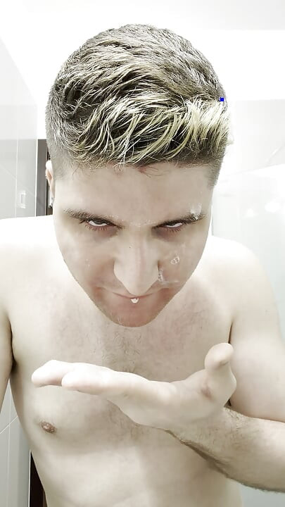 24yo boy smears his own spit on his face - playing with saliva