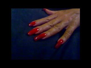 Sexy elegante Hände mit super sexy langen roten Nägeln, Fingernagel