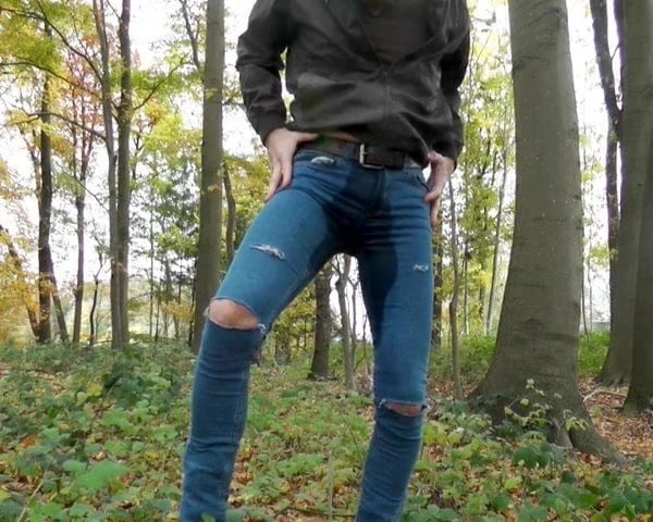 wetting my destroyed jeans in the forest