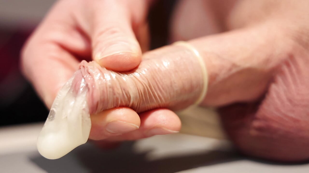Condom fills slowly with juicy precum