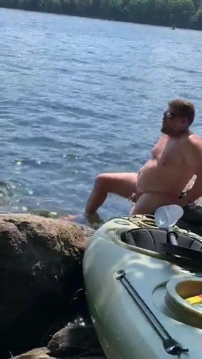 Amateur cuckold caged at the public nude beach.