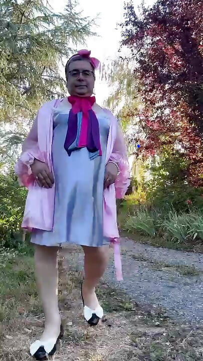 Dressed in a nightgown and robe for a morning