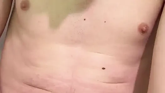 Young Ukrainian guy peeing on his own body