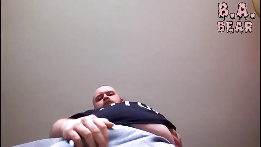 Fat Guy Wanks & Cums From Underneath