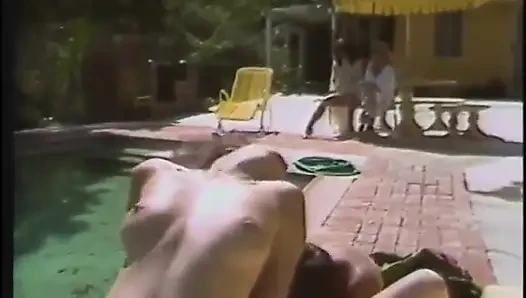 Hot babes enjoy as they give a huge pole a blowie outdoors then get fucked