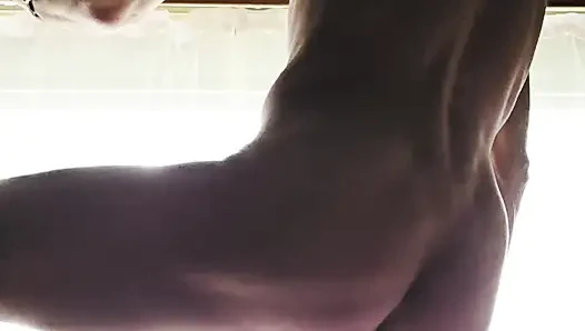 Skinny boy jerking off at the window. Everybody can See him Cumming. Huge cumshot