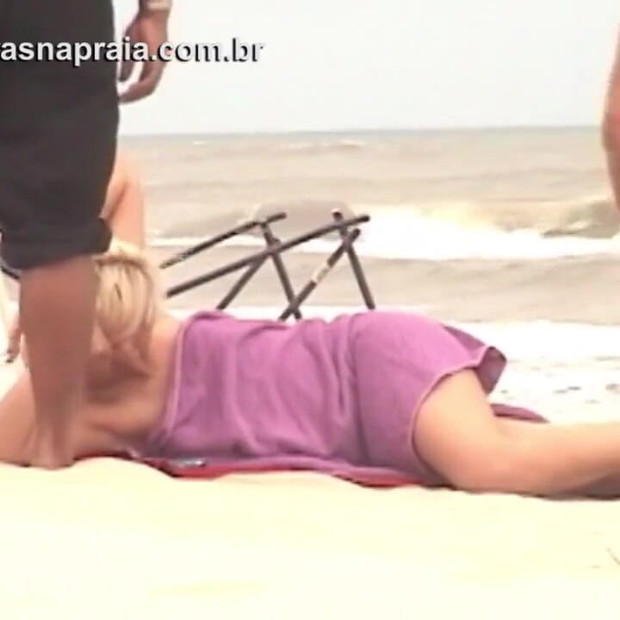 Sunbathing naked on the beach