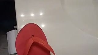 Friend having fun with his step moms Maria flip flops at home