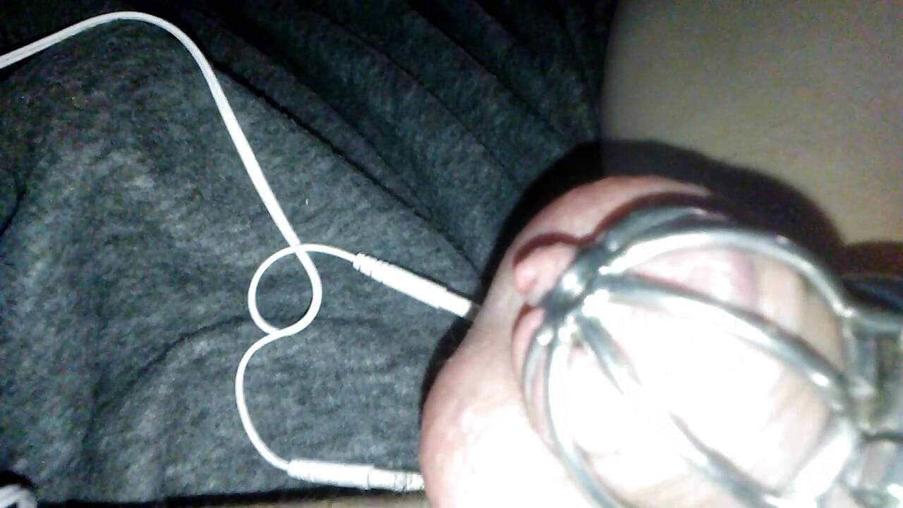 Pretty sissy Sadie caged e-stim orgasm