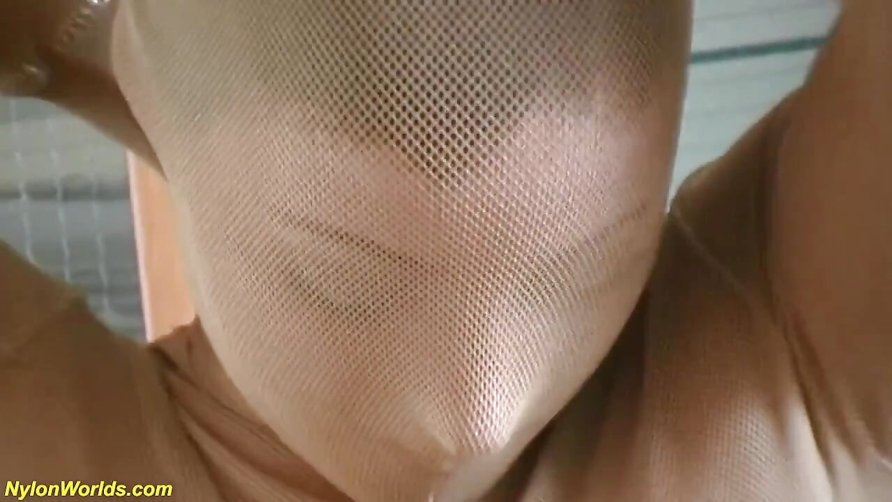 Busty flexi teen in skintight nylon catsuit shows an extreme hot striptease