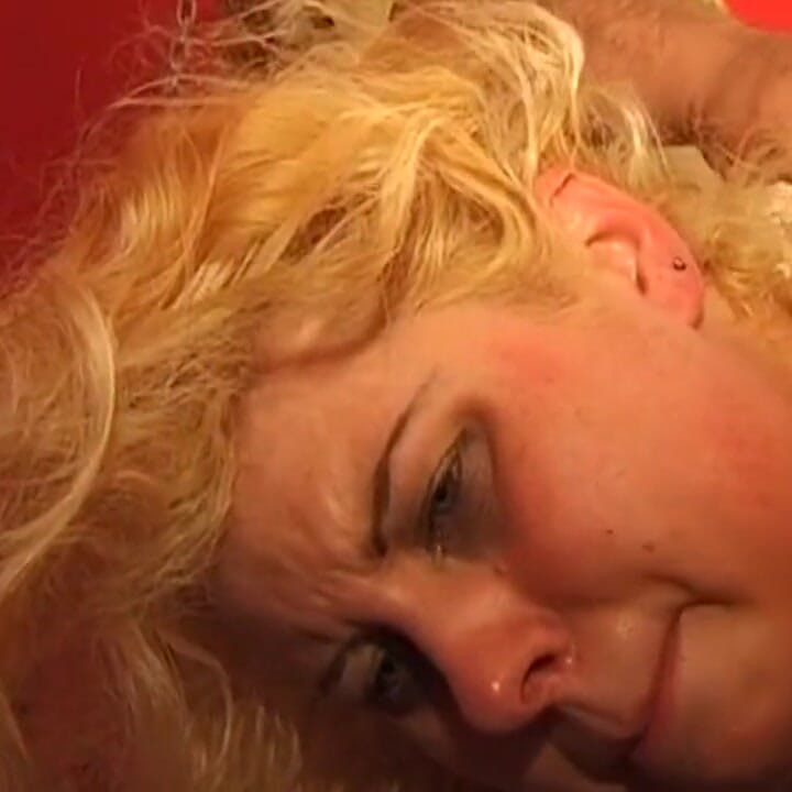 Busty Blonde MILF Submits to Intense Needle Play