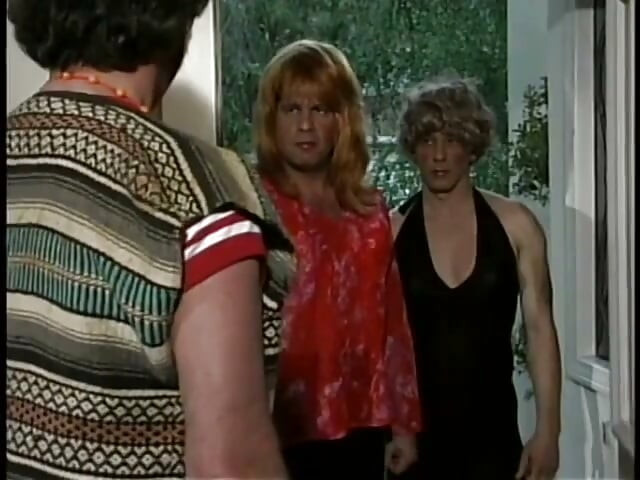 Ron Jeremy organizes orgy with a 70s crossdresser face fucking busty brunette on bed