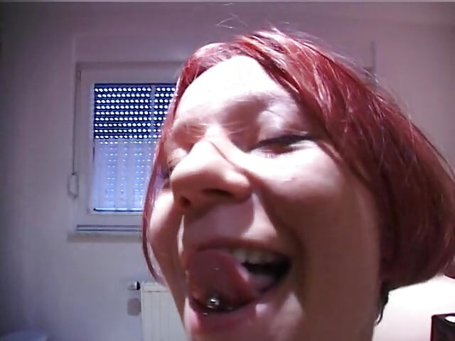 Redhead teen rubs and fingers her wet twat