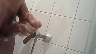 Taking a shower and wanking