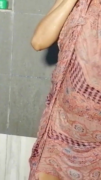 Captivating moment from "Indian Actress Miya Lust of Love Bathing Time with fabric big boobs with wet pussy in shower"