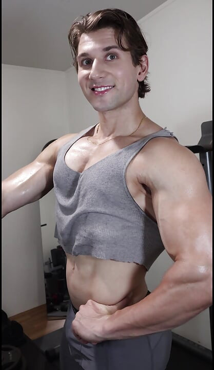 Adonis Beautiful Bodybuilder Boy Poses and Tries to Get You Workout