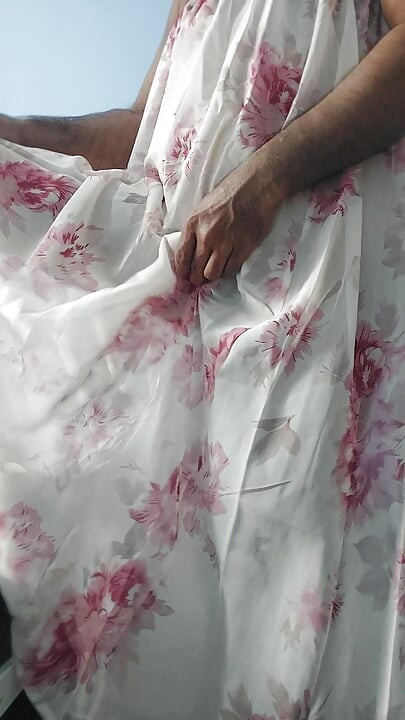 I'm masterbating in a flowery flowing silky seethrough fleard skirt and cum