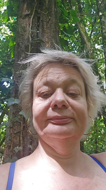I was touching myself in the woods when a voyeur caught me and fucked my pussy.