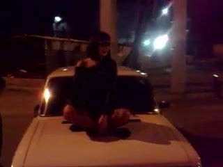 Russian whore dancing on the car