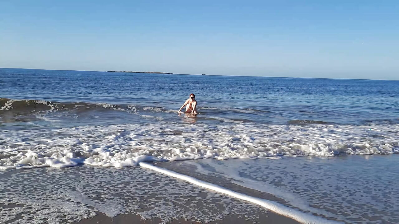 Real nudist Playing Naked in the Ocean Waves