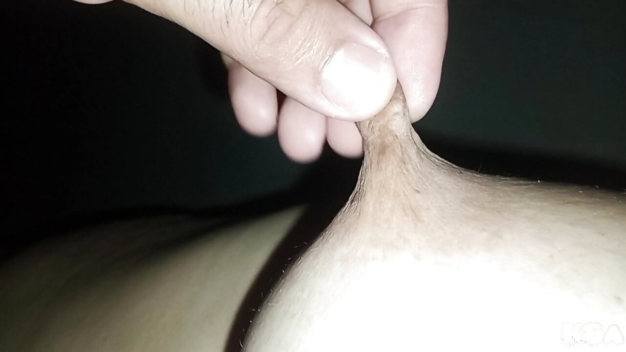My husband plays and sucks my swollen nipples, I am warmed by the rich sounds he makes when he licks my juicy tits