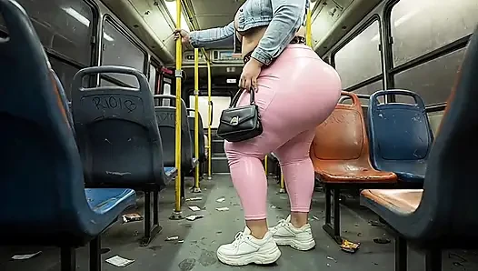 "Balaclava BBW Gets Ass  in Tight Shiny Pink Pants - Public Bus"