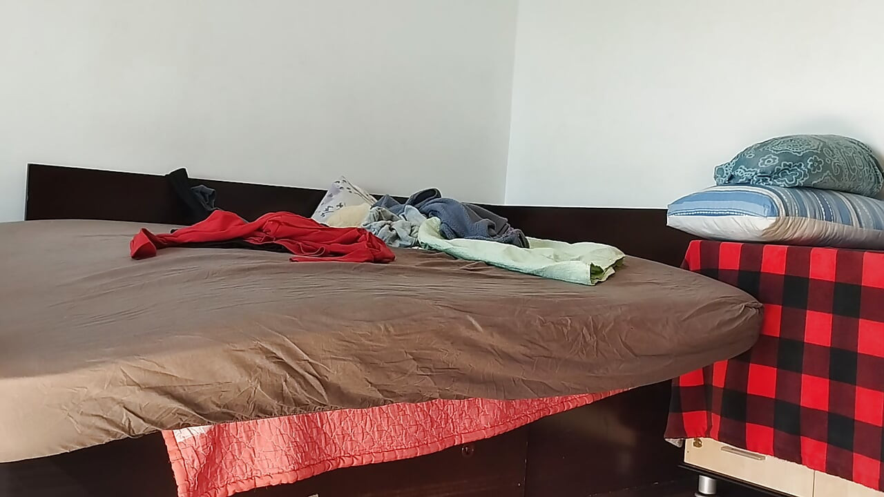 Amateur woman has fun trying on clothes and cutting them. Amateur woman vacuuming naked in the house.