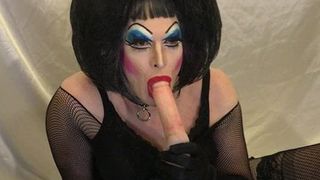 Drag Queen Slut inserts anal beads then cleans them off