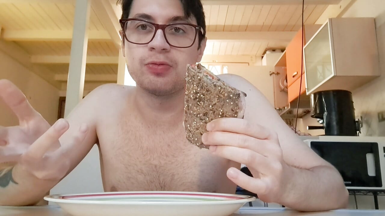 Pig guy eats a sandwich while jerking big cock