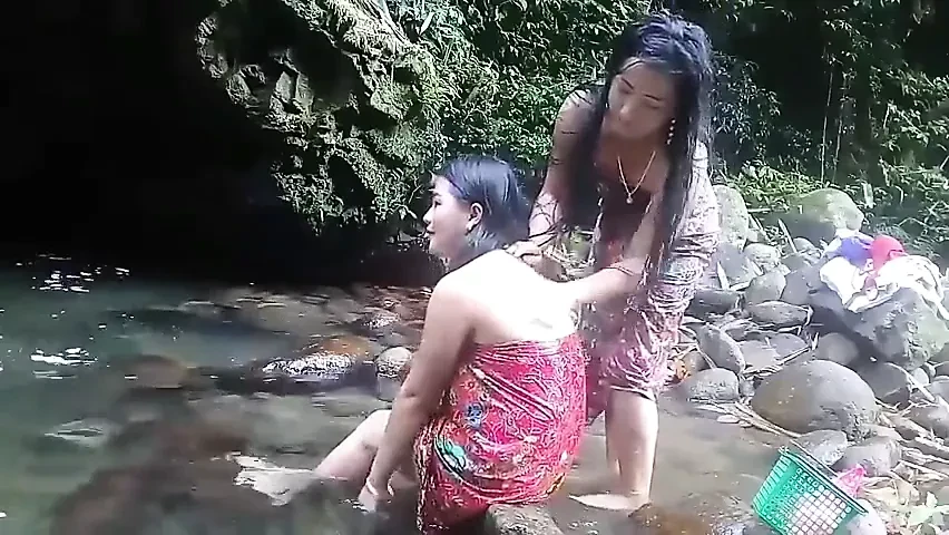 Beautiful girls having bath outdoor