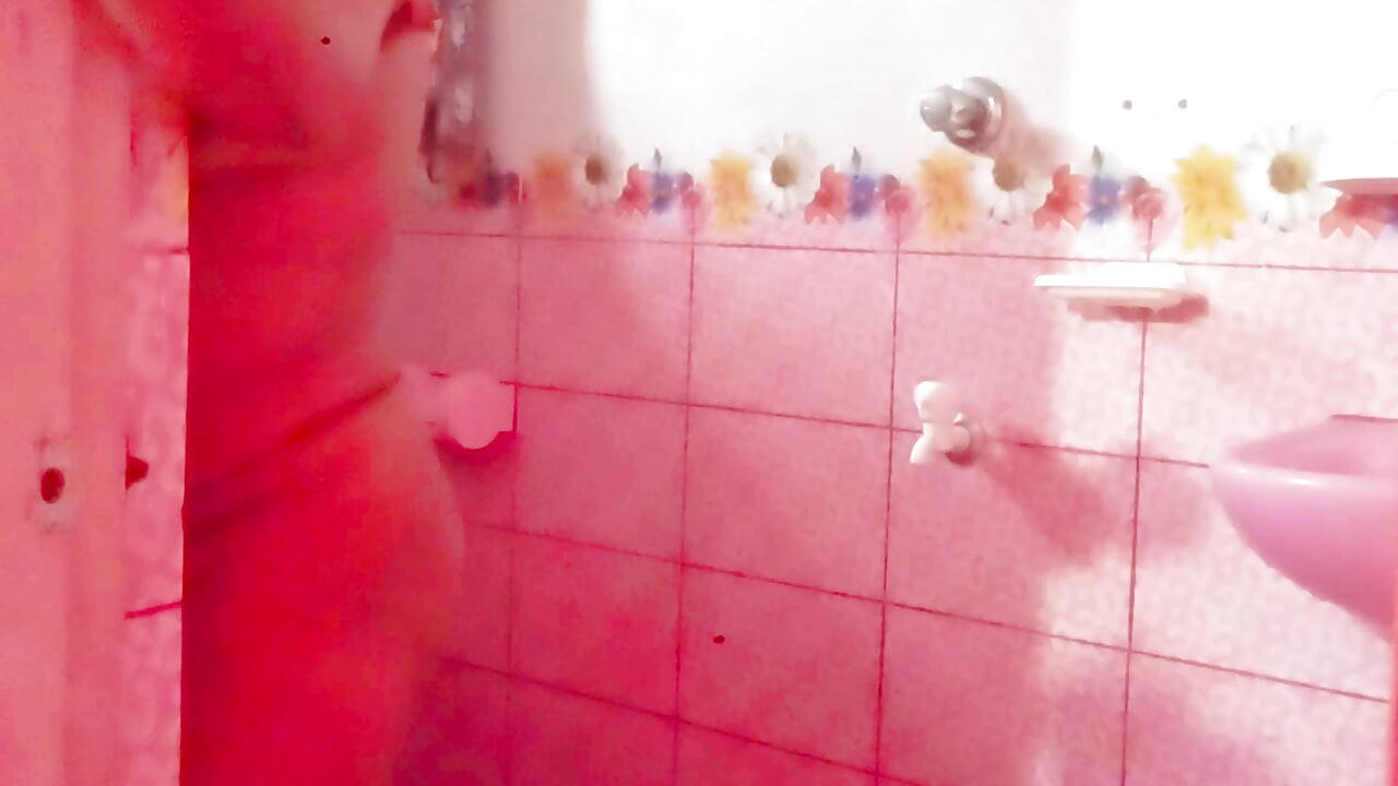 A Bangladeshi-Bihari woman is engaging in romantic sex inside the bathroom while bathing.