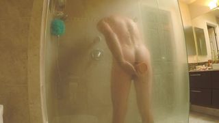 Riding large dildo in shower anal