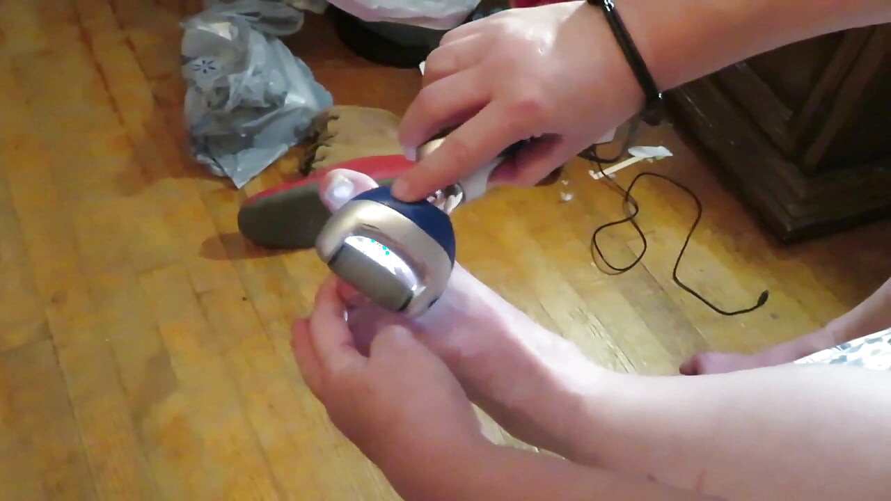 Nurse Vicki grinds her toe nails down with her electric Pedi egg tool ! Poor ugly toes need it real bad!