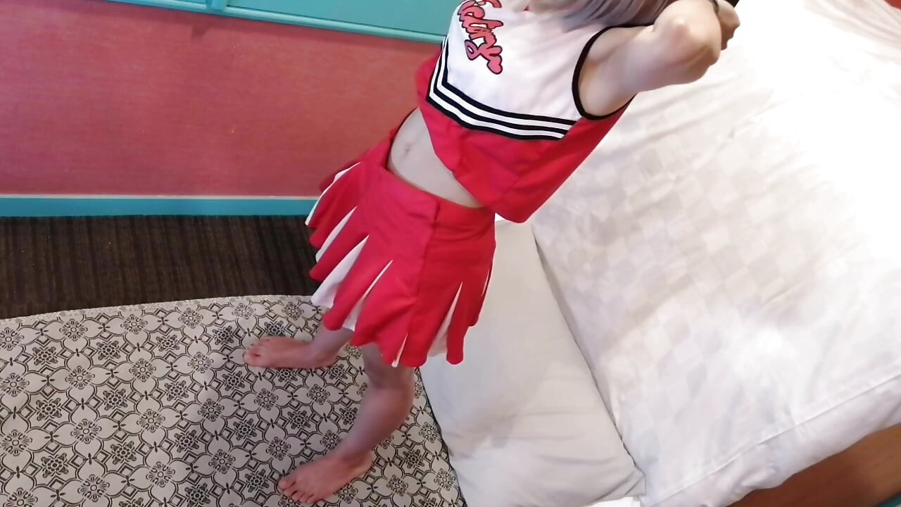 A cute, busty married woman performs exercise 4 in an erotic cheerleader costume. Peeking down from above. Home made amateur Private Shoot