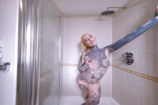 New Scene Featuring the Sexy as Hell Tattooed Sex Goddess Lauren Brock Getting Wet in the Shower