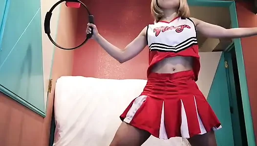 A cute, busty married woman does five exercises in a sexy cheerleader costume. Peeking down from below. Home made amateur Private Shoot