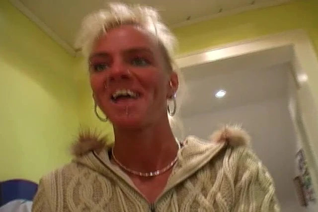 Slim and old German blonde loves stuffing her dildo deep inside