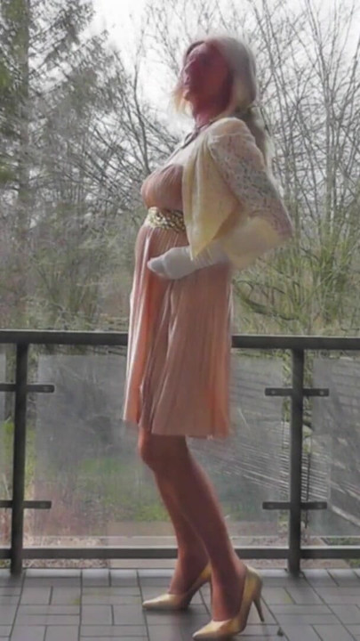 Memorable moment from "Wanking On A Winday Day In My Shiny Pleated Satin Gown"
