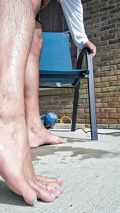Posing my wet legs and feet by the pool before I jerk off and cum
