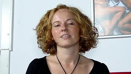 German blonde slut plays with a big dildo in solo action